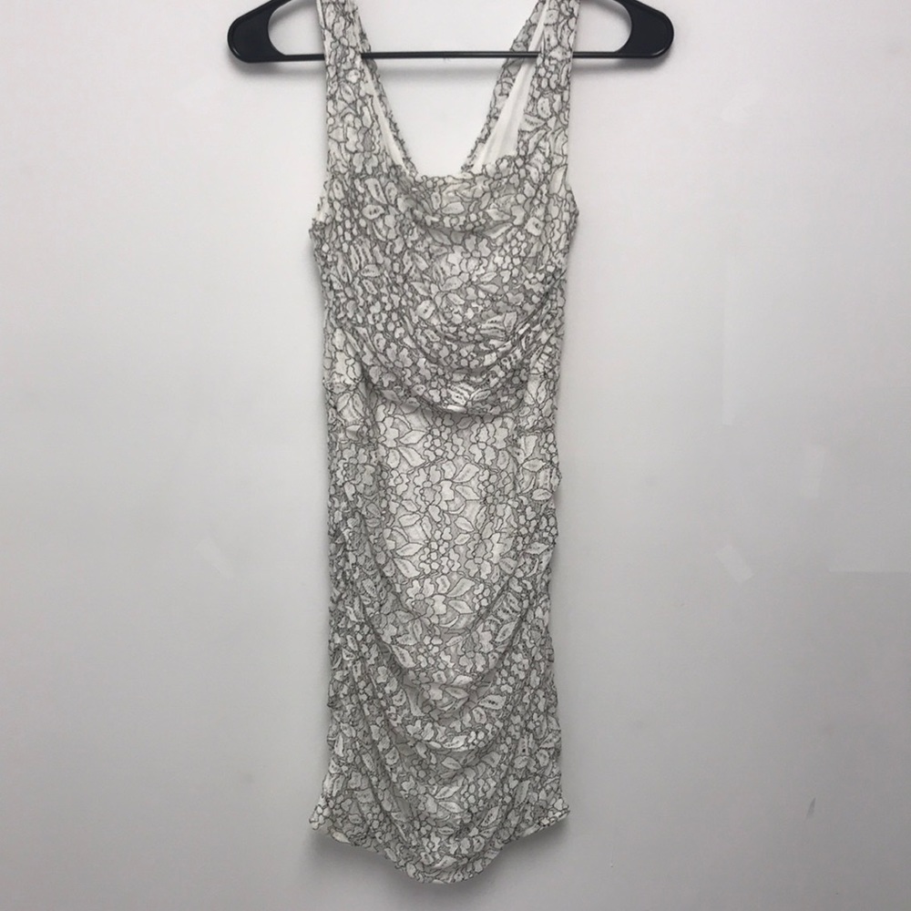 Beautiful white dress with black design.